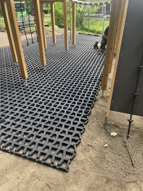 Final result. A safe and stable rubber playground safety flooring with grassy look